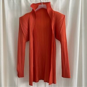 Pleats Please Issey Miyake orange cardigan